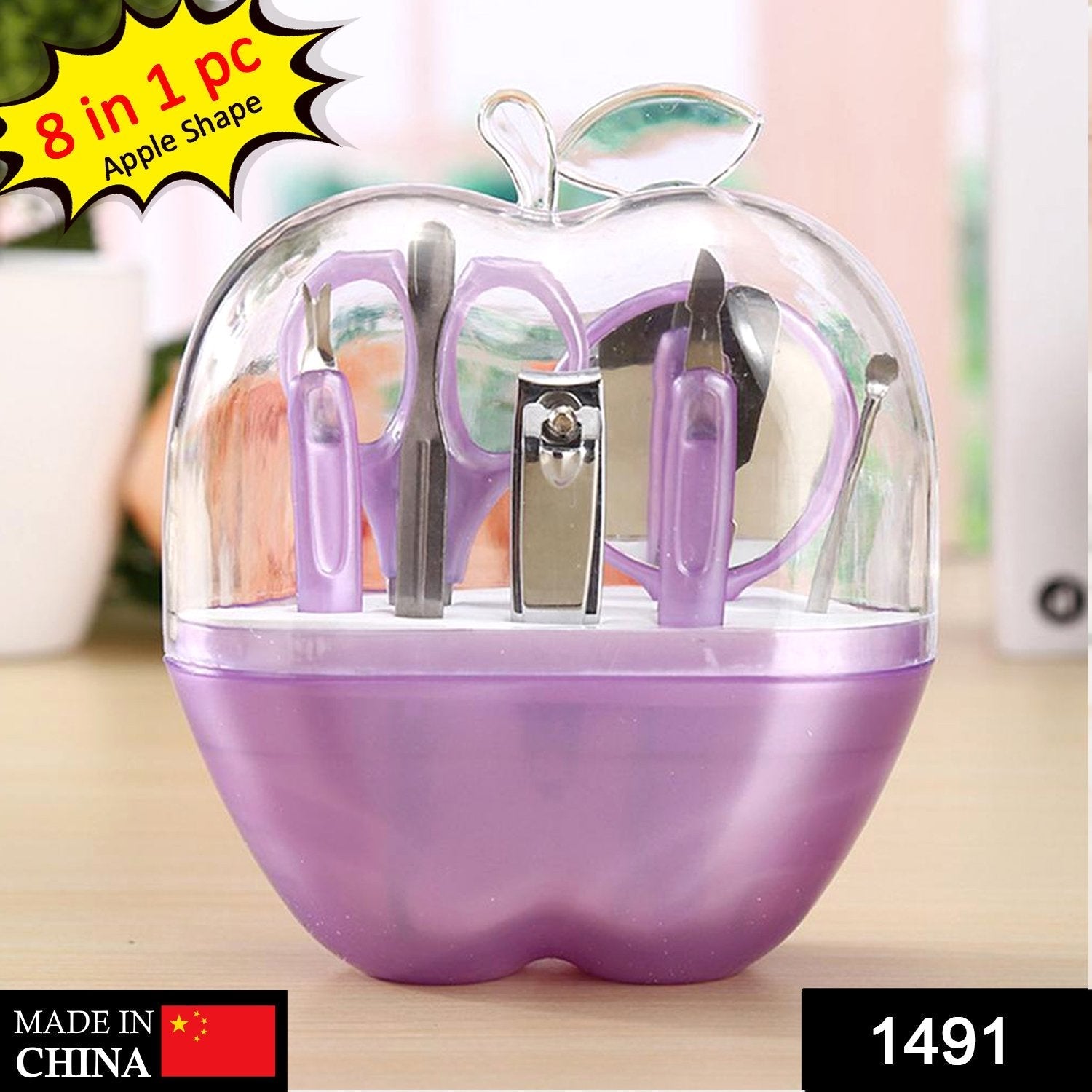 Apple-shaped manicure kit with multiple tools Apple-shaped manicure kit with multiple tools